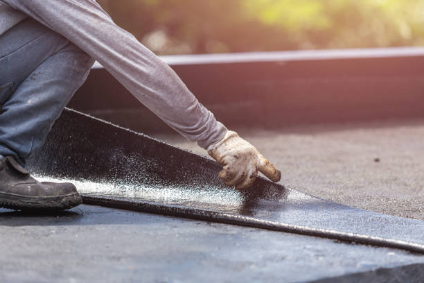 Professional Waterproofing technician working in Bridgeport, NY